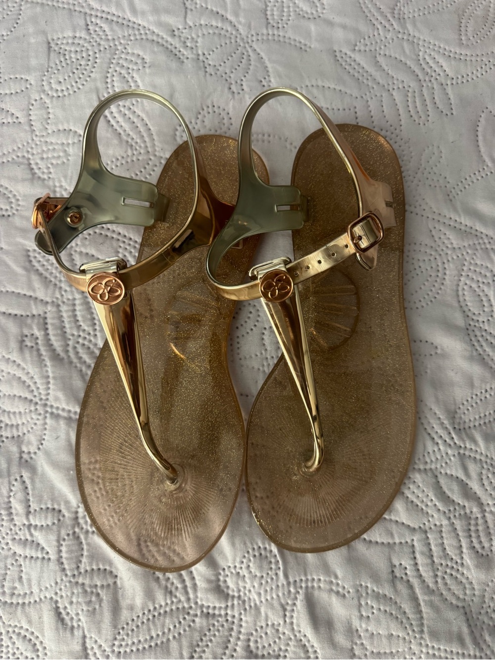 Jessica Simpson Metallic Rose Gold Jelly T-Strap Sandals with Logo Charm